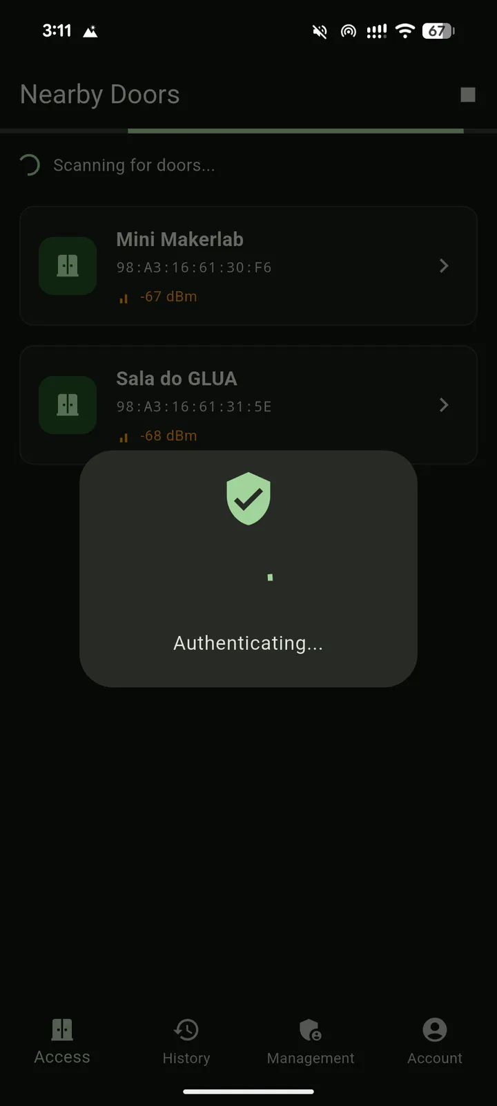 An authentication progress dialog over the nearby-door list.
